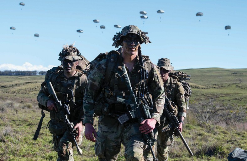 Soldiers from 3rd Battalion, 509th Parachute Infantry Regiment, arrive at Pohakuloa Training Area, Hawaii, October 7, 2024, during Joint PacificMultinational Readiness Center 25-01 (U.S. Air National Guard/John Linzmeier)